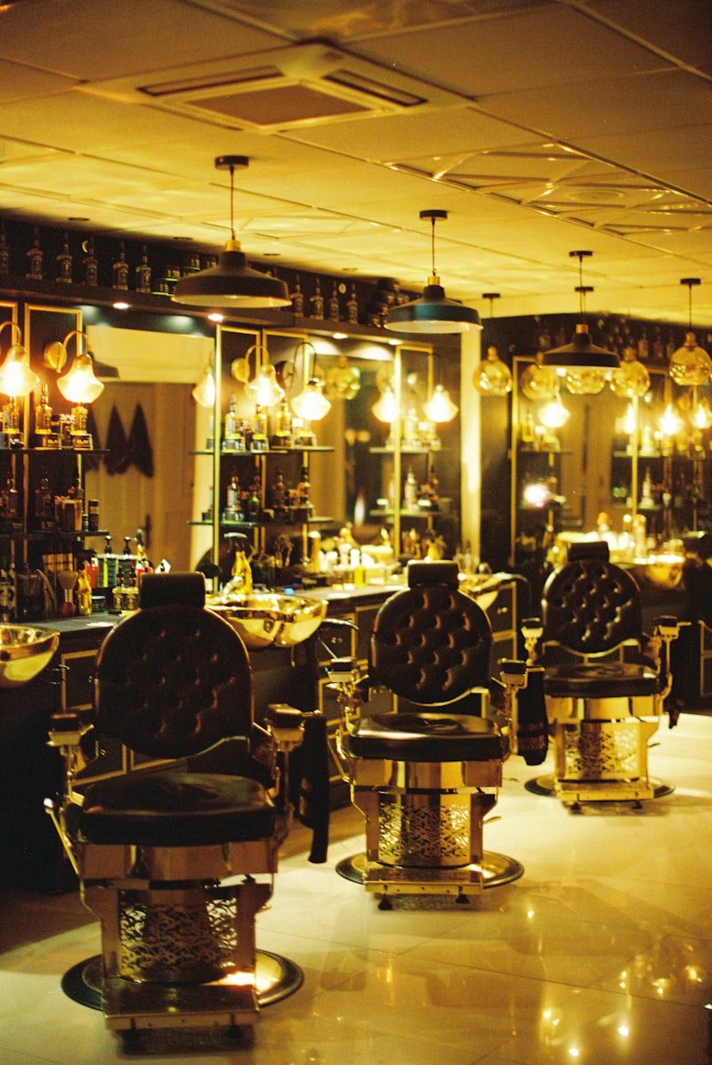 Salon chairs and wash basins in warm, low evening light
