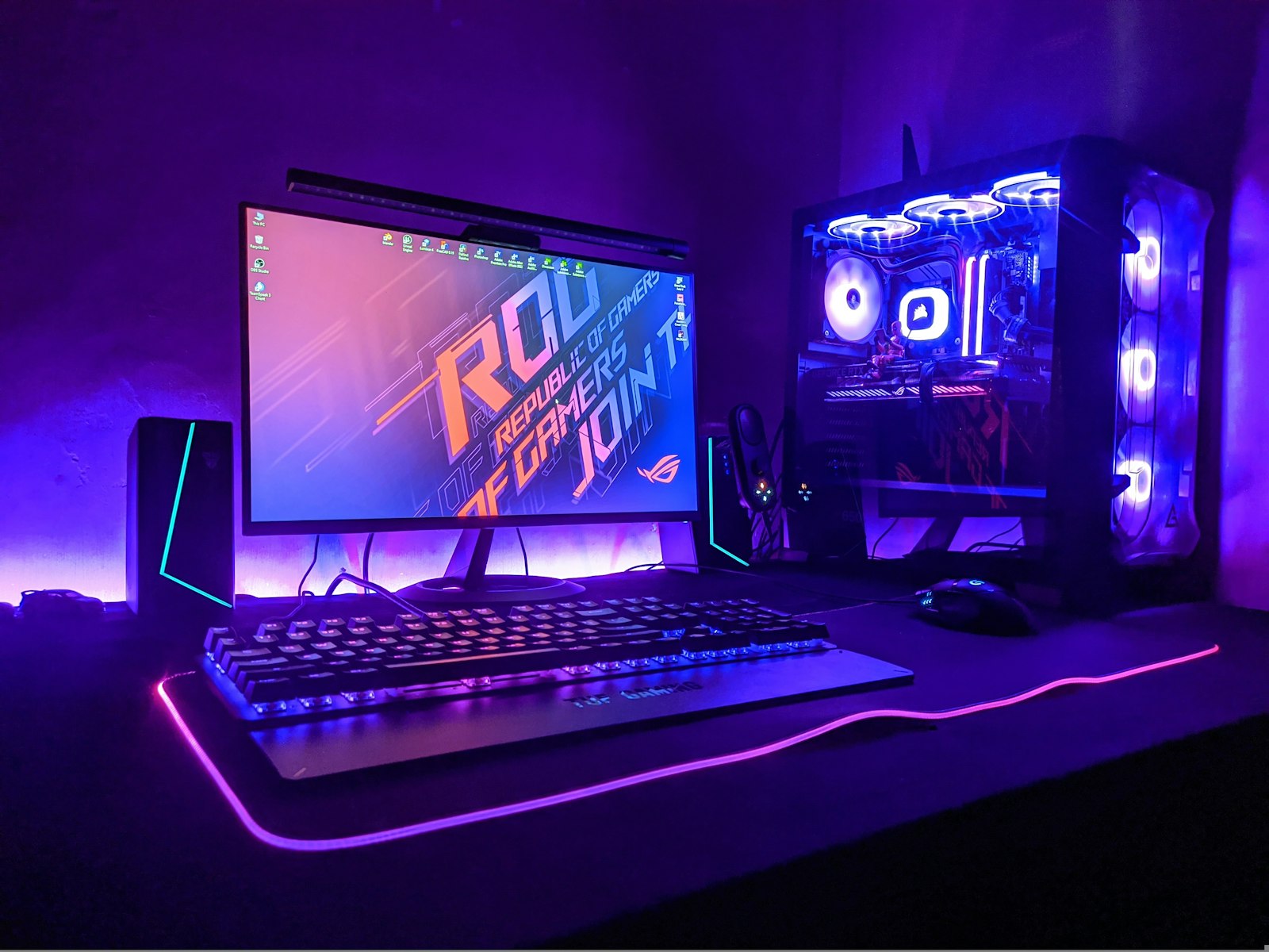 Neon-lit gaming battlestation with RGB PC at Anytime Gaming, Haldwani