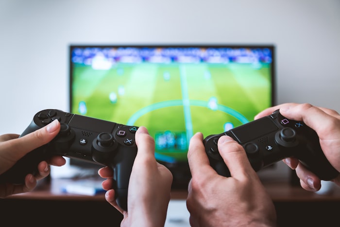 Two players holding controllers during a multiplayer match
