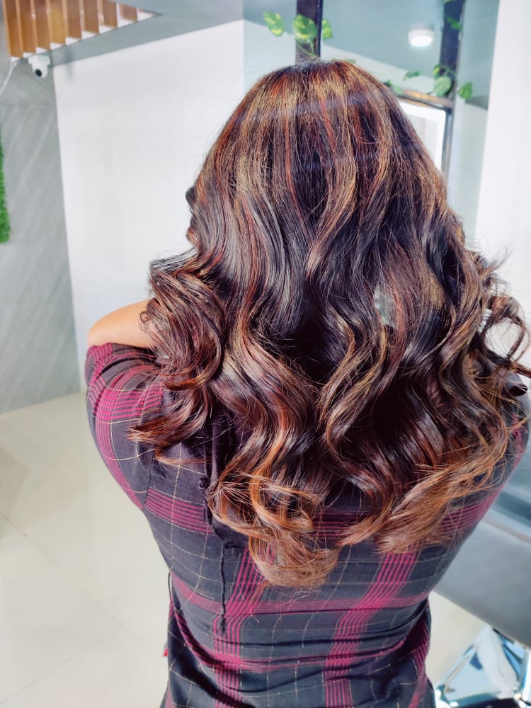 Caramel balayage with soft curls styled at Divine Salon, Pimple Gurav
