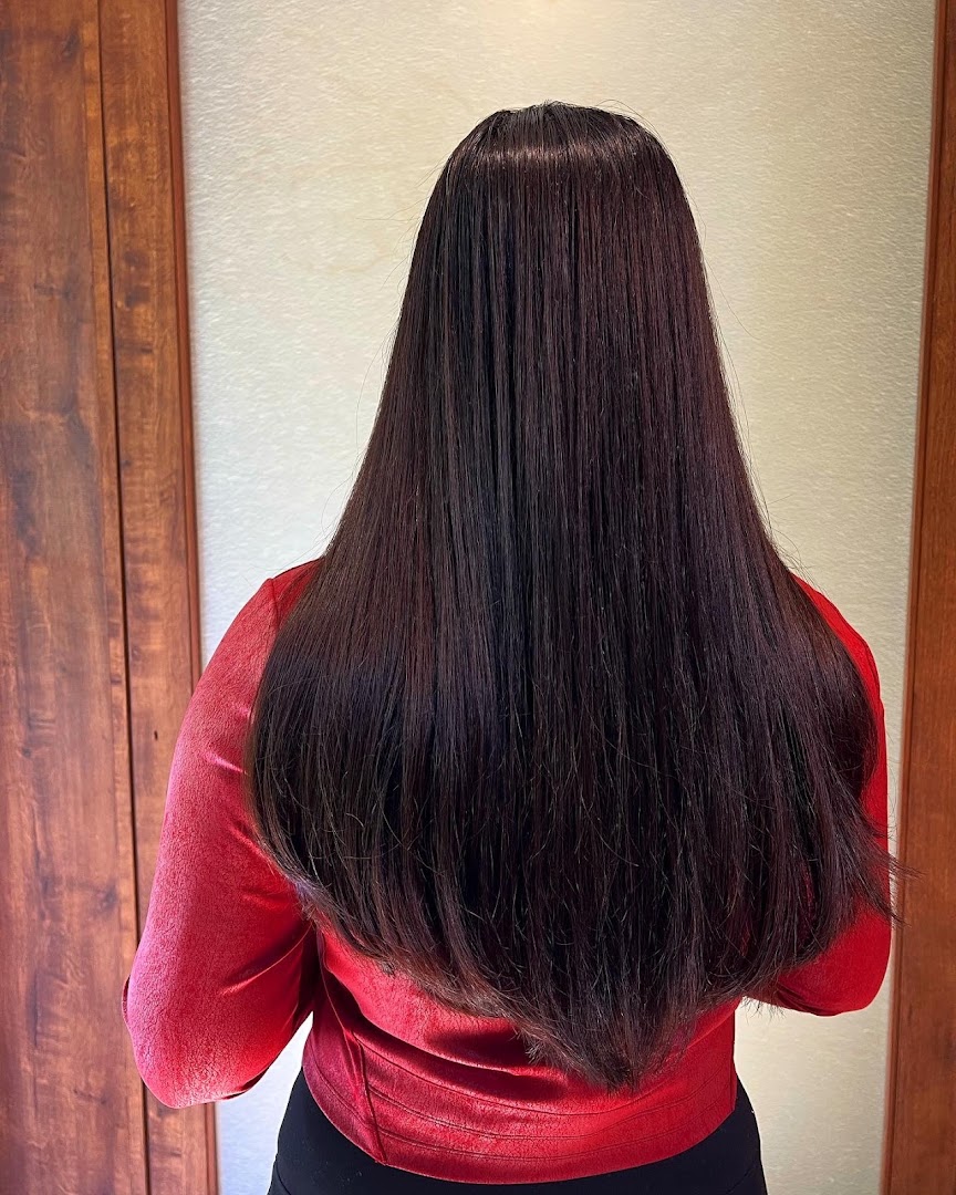 Waist-length hair finished glass-smooth after treatment and blowdry